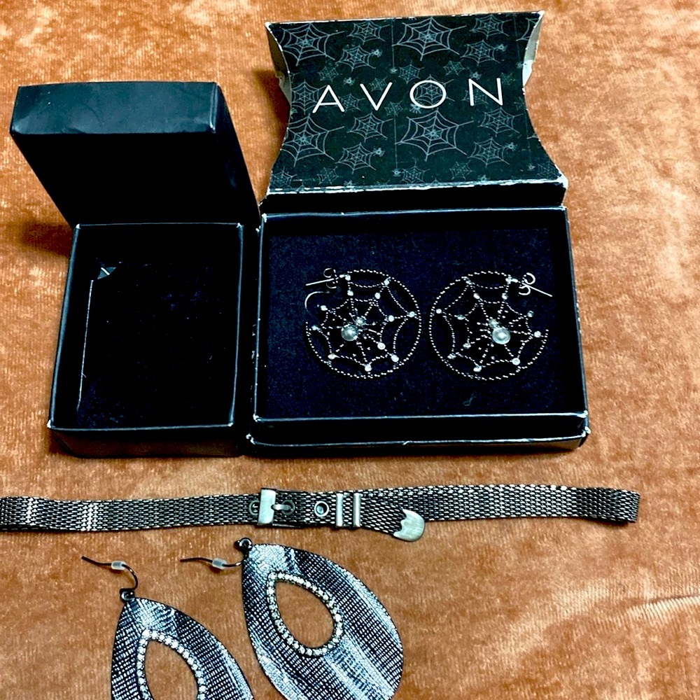 Avon Gothic lot by Avon brand new never used still in the boxes.Black/Gunmetal